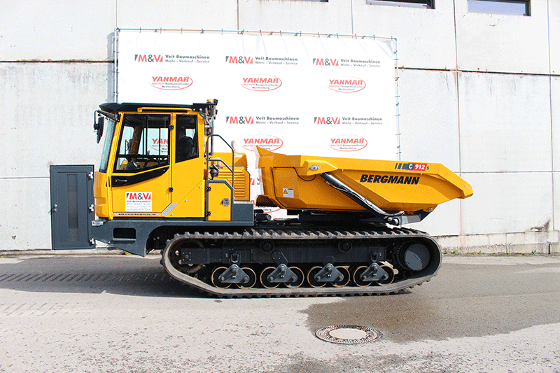 Seitenansicht des Bergmann C 912 Rundkipper Kettendumpers mit Kettenfahrwerk und robuster Bauweise für den professionellen Baustelleneinsatz.
