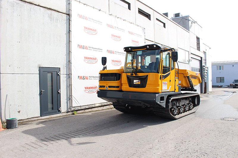 Frontansicht des Bergmann C 912 Rundkipper Kettendumpers mit robuster Bauweise und Kettenfahrwerk für den anspruchsvollen Baustelleneinsatz.