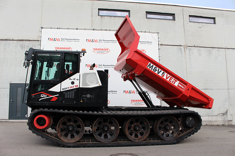 PowerBully 12 D Kettendumper im gekippten Zustand – gekippte Mulde beim Entladen für effizienten Materialumschlag auf der Baustelle