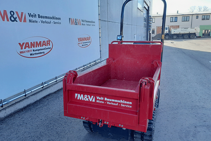 Heckansicht des Yanmar C 12 Dumper mit stabiler Konstruktion und Kettenfahrwerk für sicheren Einsatz auf anspruchsvollen Baustellen